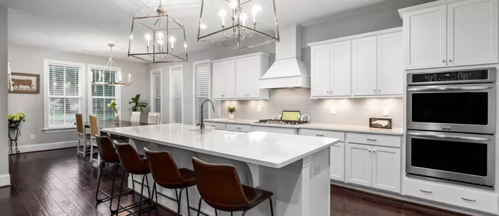 Modular open kitchen with beautiful chandeliers