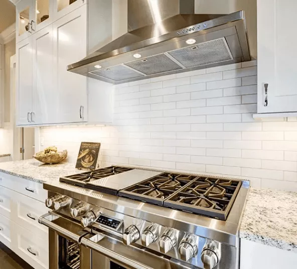beautiful kitchen with large backsplash