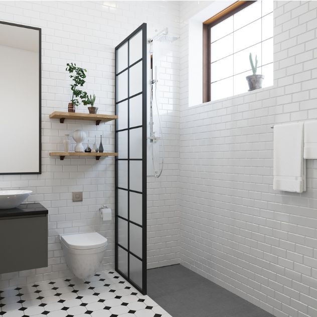 Bathroom with contrasting black and white tiles